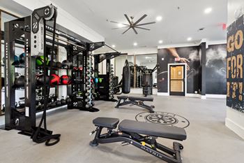 the gym at the enclave at woodbridge apartments in sugar land, tx